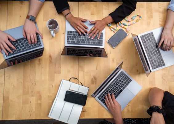 Group of people wworking on their laptops